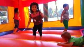 Kids Play in Inflatable Bounce House [upl. by Tlevesor283]