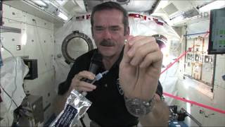 Chris Hadfield demonstrates how astronauts wash their hands in zerog [upl. by Eico581]