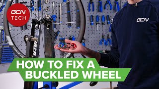 How To Fix A Buckled Bike Wheel [upl. by Lertram]