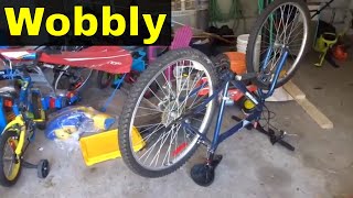 How To Straighten A Wobbly Bicycle WheelTutorial [upl. by Notlrahc]