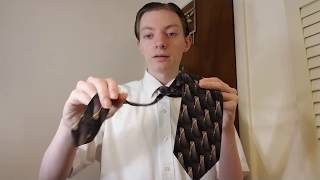 How To Tie A Necktie [upl. by Dilly]